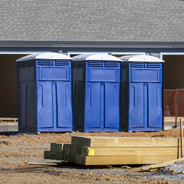 what is the cost difference between standard and deluxe portable restroom rentals in Queenstown MD